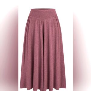 Wine colored jersey wide leg trousers with pockets.